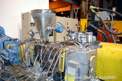 Used Compounding Line Consisting Of: (1) Farrel size 4LMSD Continuous Mixer. Modified top feed, side discharge. Oil heated, over-under rotor design. Driven by a 150hp, 500 volt, 1750 rpm DC motor thr...