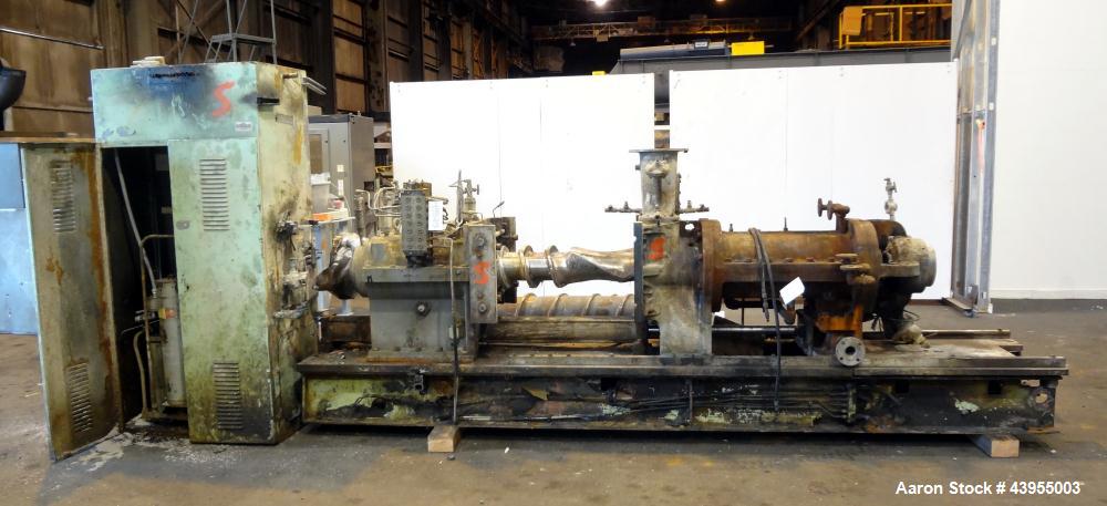 Used Farrel Continuous Mixer, Model 9FCM. Approximate 1881 cubic inch mixing chamber, rated up to 10000 pounds per hour. Jacketed chamber, chrome cored rotors. Approximate 1000hp motor with Lufkin ge...