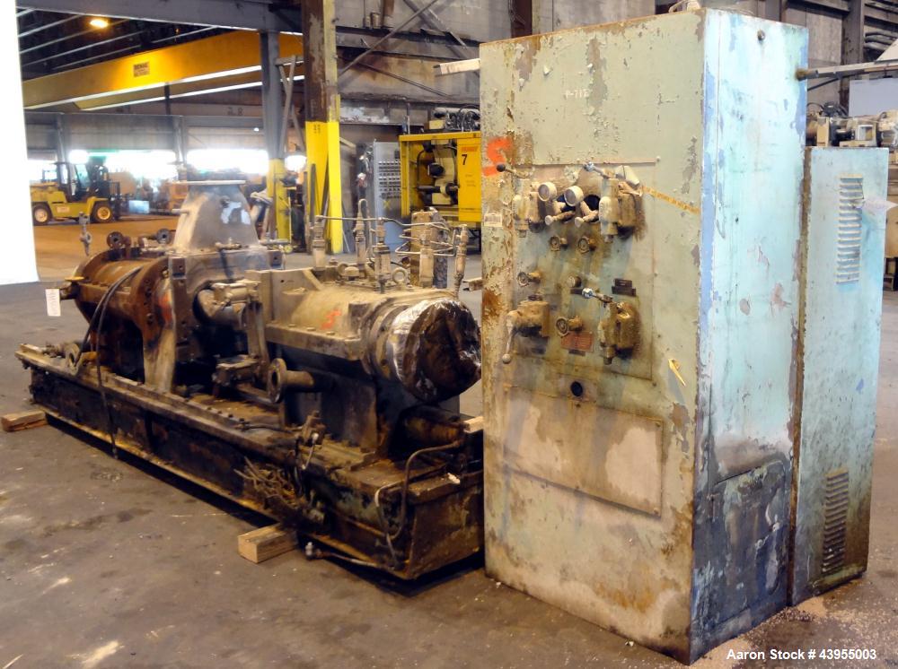 Used Farrel Continuous Mixer, Model 9FCM. Approximate 1881 cubic inch mixing chamber, rated up to 10000 pounds per hour. Jacketed chamber, chrome cored rotors. Approximate 1000hp motor with Lufkin ge...