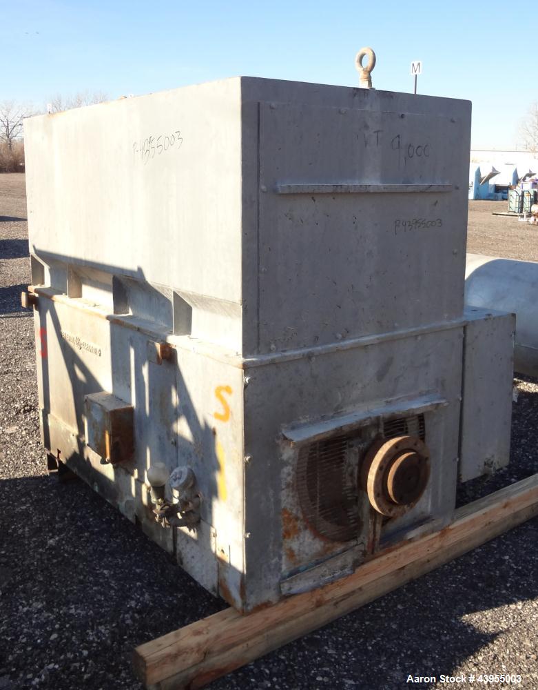Used Farrel Continuous Mixer, Model 9FCM. Approximate 1881 cubic inch mixing chamber, rated up to 10000 pounds per hour. Jacketed chamber, chrome cored rotors. Approximate 1000hp motor with Lufkin ge...