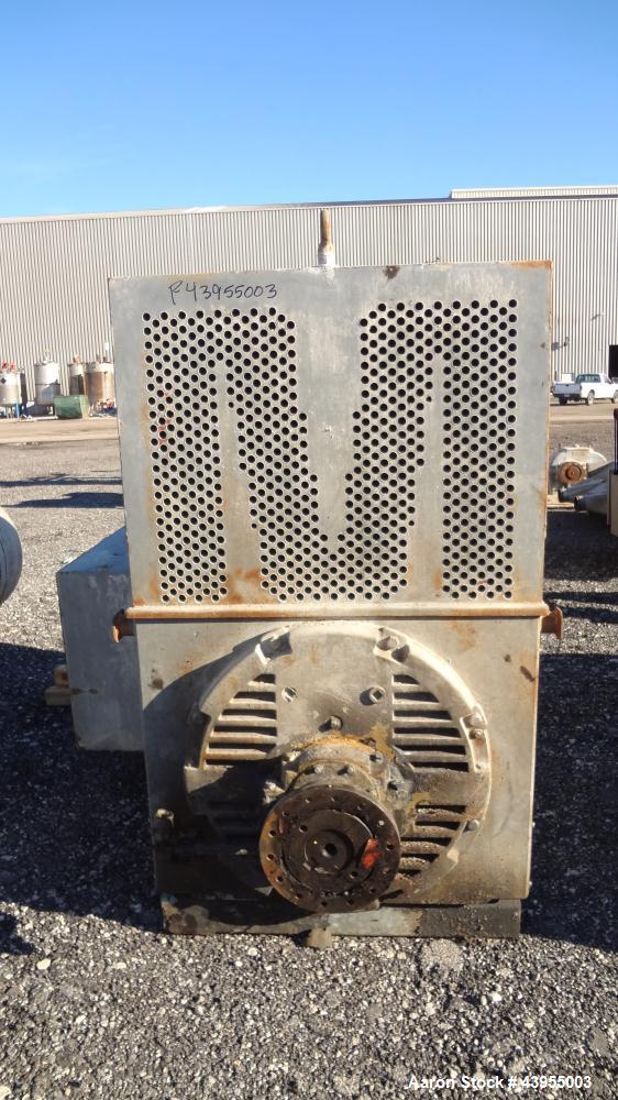 Used Farrel Continuous Mixer, Model 9FCM. Approximate 1881 cubic inch mixing chamber, rated up to 10000 pounds per hour. Jacketed chamber, chrome cored rotors. Approximate 1000hp motor with Lufkin ge...