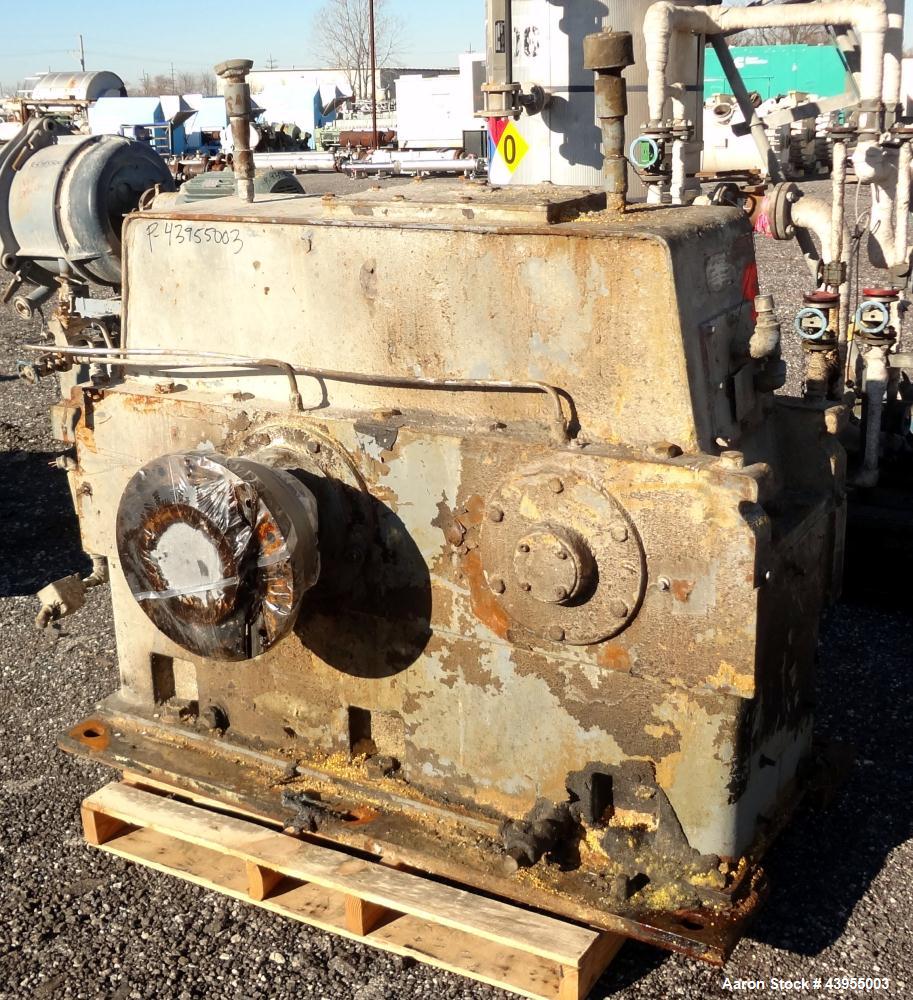 Used Farrel Continuous Mixer, Model 9FCM. Approximate 1881 cubic inch mixing chamber, rated up to 10000 pounds per hour. Jacketed chamber, chrome cored rotors. Approximate 1000hp motor with Lufkin ge...