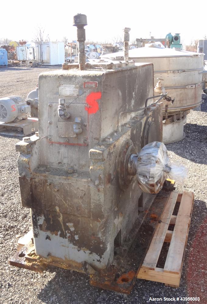 Used Farrel Continuous Mixer, Model 9FCM. Approximate 1881 cubic inch mixing chamber, rated up to 10000 pounds per hour. Jacketed chamber, chrome cored rotors. Approximate 1000hp motor with Lufkin ge...