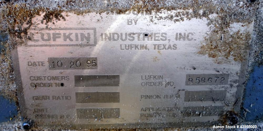 Used Farrel Continuous Mixer, Model 9FCM. Approximate 1881 cubic inch mixing chamber, rated up to 10000 pounds per hour. Jacketed chamber, chrome cored rotors. Approximate 1000hp motor with Lufkin ge...