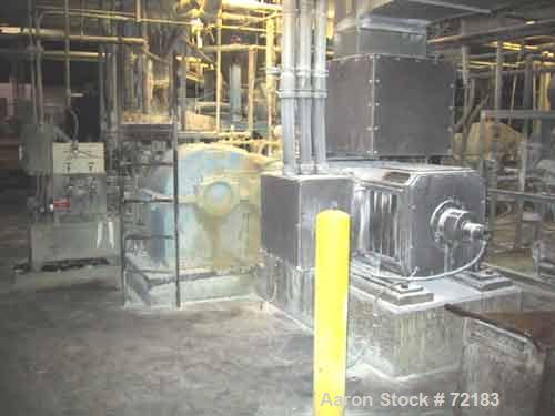 USED: Farrel continuous mixer, model #9FCM. Cored #15 style rotors with rotary unions, 1881 cu in mixing chamber. Rated approx up to10,000 pounds an hour. Driven by a 600 hp DC motor thru a Farrel ge...