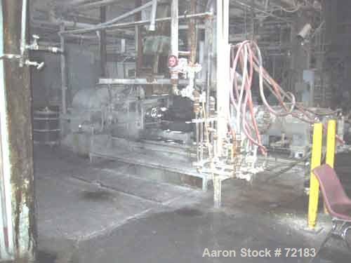 USED: Farrel continuous mixer, model #9FCM. Cored #15 style rotors with rotary unions, 1881 cu in mixing chamber. Rated approx up to10,000 pounds an hour. Driven by a 600 hp DC motor thru a Farrel ge...