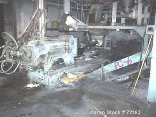 USED: Farrel continuous mixer, model #9FCM. Cored #15 style rotors with rotary unions, 1881 cu in mixing chamber. Rated approx up to10,000 pounds an hour. Driven by a 600 hp DC motor thru a Farrel ge...