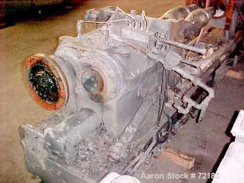 USED: Farrel continuous mixer, model #9FCM. Cored #15 style rotors with rotary unions, 1881 cu in mixing chamber. Rated approx up to10,000 pounds an hour. Driven by a 600 hp DC motor thru a Farrel ge...