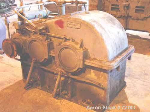 USED: Farrel continuous mixer, model #9FCM. Cored #15 style rotors with rotary unions, 1881 cu in mixing chamber. Rated approx up to10,000 pounds an hour. Driven by a 600 hp DC motor thru a Farrel ge...
