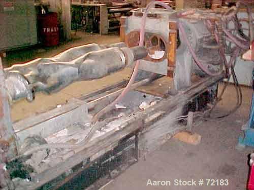 USED: Farrel continuous mixer, model #9FCM. Cored #15 style rotors with rotary unions, 1881 cu in mixing chamber. Rated approx up to10,000 pounds an hour. Driven by a 600 hp DC motor thru a Farrel ge...