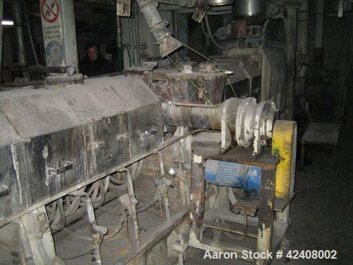 Used Maris TM 92 Compounding Line with a co-rotating twin screw extruder, 3.62" (92 mm) screws, L/D 44, output 1323 - 2201 lbs/hr (600-1,000 kg/hr). Used for PA 6/66 // ABS // PBT // PS // PP // PE. ...
