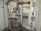 Used Buss Ko-Kneader, 55mm, Model PCS 55-8D. 8:1 L/D, driven by a 40 hp AC motor with inverter. Has Panelview touch screen operator control and includes main electrical panel. Serial #453586-2, sales...