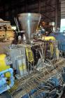 Used Compounding Line Consisting Of: (1) Farrel size 4LMSD Continuous Mixer. Modified top feed, side discharge. Oil heated, over-under rotor design. Driven by a 150hp, 500 volt, 1750 rpm DC motor thr...