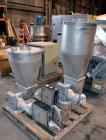 Used Compounding Line Consisting Of: (1) Farrel size 4LMSD Continuous Mixer. Modified top feed, side discharge. Oil heated, over-under rotor design. Driven by a 150hp, 500 volt, 1750 rpm DC motor thr...