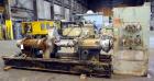 Used Farrel Continuous Mixer, Model 9FCM. Approximate 1881 cubic inch mixing chamber, rated up to 10000 pounds per hour. Jacketed chamber, chrome cored rotors. Approximate 1000hp motor with Lufkin ge...