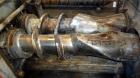 Used Farrel Continuous Mixer, Model 9FCM. Approximate 1881 cubic inch mixing chamber, rated up to 10000 pounds per hour. Jacketed chamber, chrome cored rotors. Approximate 1000hp motor with Lufkin ge...