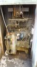Used Farrel Continuous Mixer, Model 9FCM. Approximate 1881 cubic inch mixing chamber, rated up to 10000 pounds per hour. Jacketed chamber, chrome cored rotors. Approximate 1000hp motor with Lufkin ge...