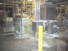 USED: Farrel continuous mixer, model #9FCM. Cored #15 style rotors with rotary unions, 1881 cu in mixing chamber. Rated approx up to10,000 pounds an hour. Driven by a 600 hp DC motor thru a Farrel ge...