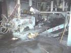 USED: Farrel continuous mixer, model #9FCM. Cored #15 style rotors with rotary unions, 1881 cu in mixing chamber. Rated approx up to10,000 pounds an hour. Driven by a 600 hp DC motor thru a Farrel ge...