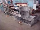 USED: Farrel continuous mixer, model #9FCM. Cored #15 style rotors with rotary unions, 1881 cu in mixing chamber. Rated approx up to10,000 pounds an hour. Driven by a 600 hp DC motor thru a Farrel ge...