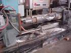 USED: Farrel continuous mixer, model #9FCM. Cored #15 style rotors with rotary unions, 1881 cu in mixing chamber. Rated approx up to10,000 pounds an hour. Driven by a 600 hp DC motor thru a Farrel ge...
