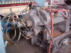 USED: Farrel continuous mixer, model #9FCM. Cored #15 style rotors with rotary unions, 1881 cu in mixing chamber. Rated approx up to10,000 pounds an hour. Driven by a 600 hp DC motor thru a Farrel ge...
