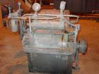 USED: Farrel continuous mixer, model #9FCM. Cored #15 style rotors with rotary unions, 1881 cu in mixing chamber. Rated approx up to10,000 pounds an hour. Driven by a 600 hp DC motor thru a Farrel ge...