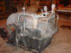 USED: Farrel continuous mixer, model #9FCM. Cored #15 style rotors with rotary unions, 1881 cu in mixing chamber. Rated approx up to10,000 pounds an hour. Driven by a 600 hp DC motor thru a Farrel ge...