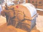 USED: Farrel continuous mixer, model #9FCM. Cored #15 style rotors with rotary unions, 1881 cu in mixing chamber. Rated approx up to10,000 pounds an hour. Driven by a 600 hp DC motor thru a Farrel ge...