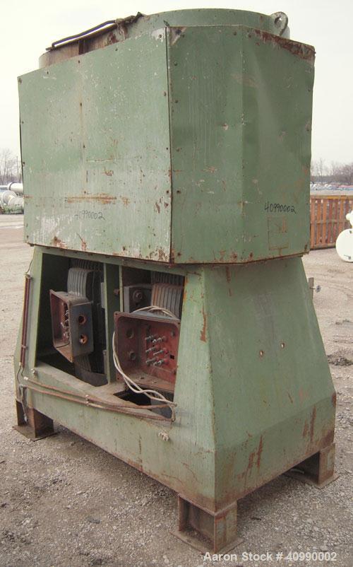Used Densifier, Carbon Steel. Oval shaped bowl approximately 64" long x 31" wide x 42" deep. (2) bottom blades, each driven by a 132 kW (176.9 hp), 3/60/208 volt, 1780 rpm motor. Hinged top cover wit...