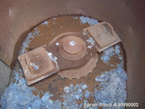 Used Densifier, Carbon Steel. Oval shaped bowl approximately 64" long x 31" wide x 42" deep. (2) bottom blades, each driven by a 132 kW (176.9 hp), 3/60/208 volt, 1780 rpm motor. Hinged top cover wit...