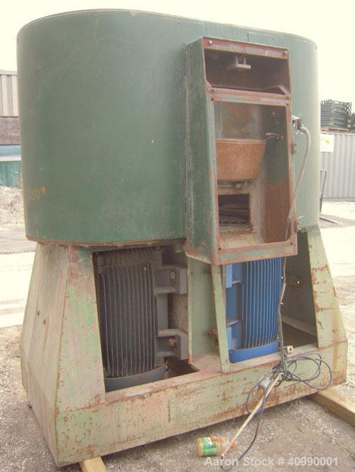 Used Densifier, Carbon Steel. Oval shaped bowl approximately 70" long x 35" wide x 40" deep. (2) bottom blades, (1) driven by a 175 hp, 3/60/460 volt, 1780 rpm motor, (1) driven by an approximate 175...