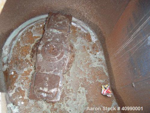 Used Densifier, Carbon Steel. Oval shaped bowl approximately 70" long x 35" wide x 40" deep. (2) bottom blades, (1) driven by a 175 hp, 3/60/460 volt, 1780 rpm motor, (1) driven by an approximate 175...