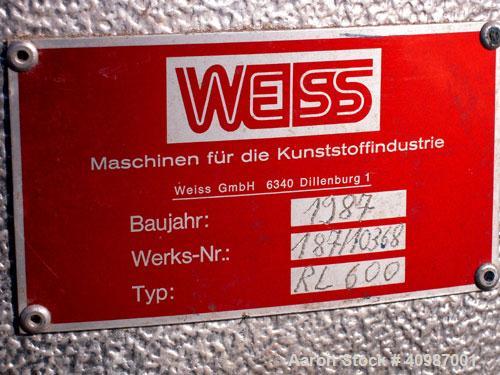 Used Weiss Densifier, model RL600, carbon steel. Approximately 600 liter capacity. Oval shaped bowl 26'' x 50'' x 43'' deep. (2) Bottom blades, each driven by an approximate 50 hp motor. Back outlet ...
