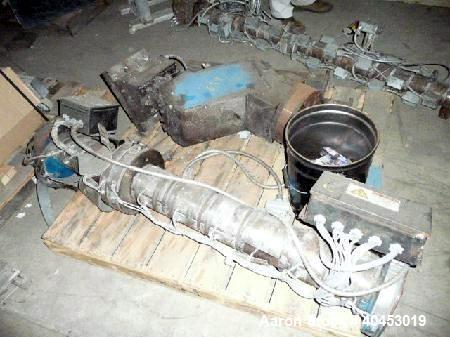 Used Extrusion Dies Inc. Co-extrusion block with various distribution blocks, piping and static mixers, previously used between 5 extruders and die.