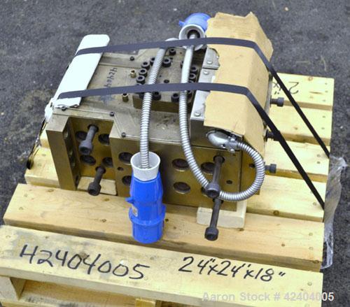 Used Die Block. Approximate 2"wide x 3/4"tall, 3/4" diameter back center feed.