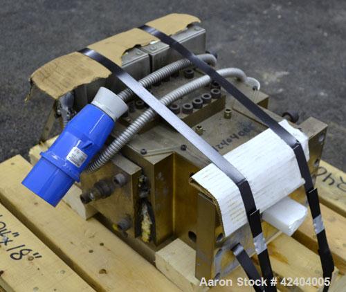 Used Die Block. Approximate 2"wide x 3/4"tall, 3/4" diameter back center feed.