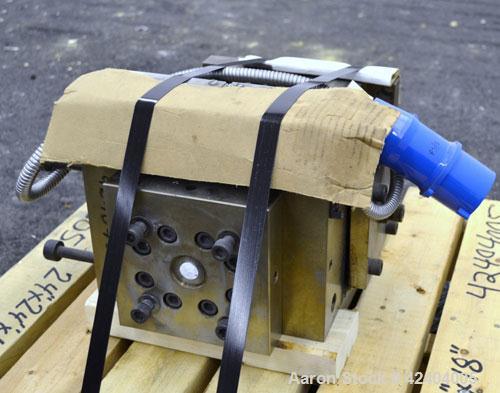 Used Die Block. Approximate 2"wide x 3/4"tall, 3/4" diameter back center feed.