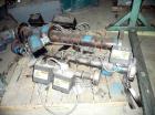 Used Extrusion Dies Inc. Co-extrusion block with various distribution blocks, piping and static mixers, previously used between 5 extruders and die.