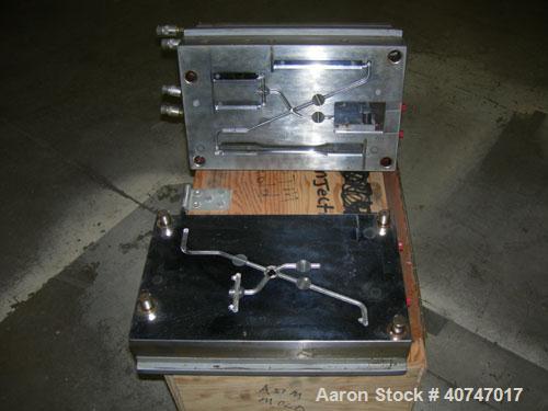 Used ASTM Test Mold. Last used with an 85 ton injection mold machine.