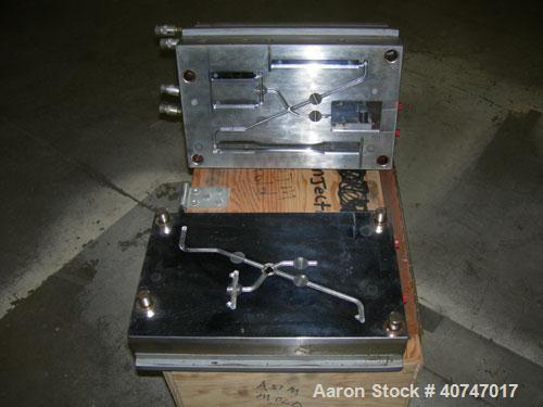 Used- ASTM Test Mold. Last used with an 85 ton injection mold machine.