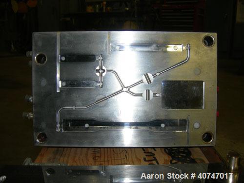 Used ASTM Test Mold. Last used with an 85 ton injection mold machine.