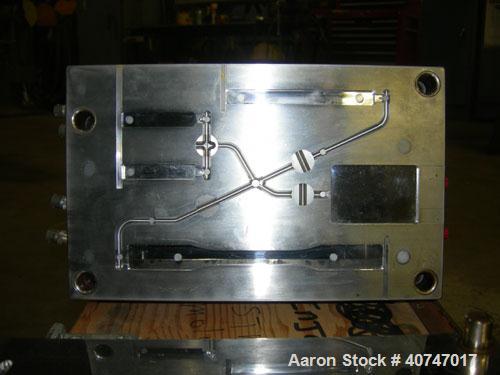 Used- ASTM Test Mold. Last used with an 85 ton injection mold machine.