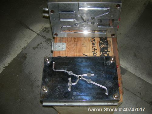 Used- ASTM Test Mold. Last used with an 85 ton injection mold machine.