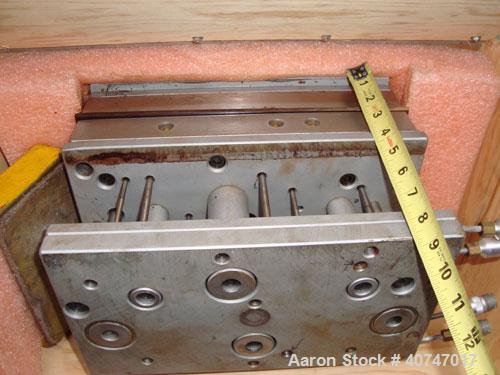 Used ASTM Test Mold. Last used with an 85 ton injection mold machine.