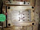 USED: Lab race track mold for a 50 ton injection mold machine.
