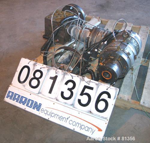 USED: Pipe die, approximately 2-1/2" diameter O.D., 2" I.D. Includes adapter. Last used on a 3-1/2" extruder.