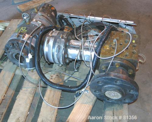 USED: Pipe die, approximately 2-1/2" diameter O.D., 2" I.D. Includes adapter. Last used on a 3-1/2" extruder.