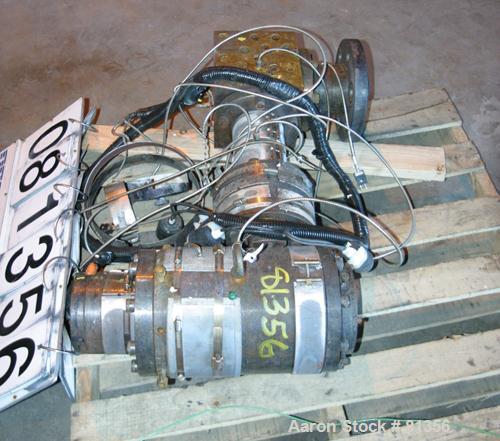 USED: Pipe die, approximately 2-1/2" diameter O.D., 2" I.D. Includes adapter. Last used on a 3-1/2" extruder.