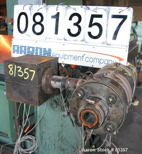 USED: Pipe die, approximately 2-1/2" diameter O.D., 2" I.D. Includes adapter. Last used on a 3-1/2" extruder.